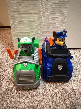 Never used. Paw Patrol Chase and Rocky Rescue Vehicles and figures